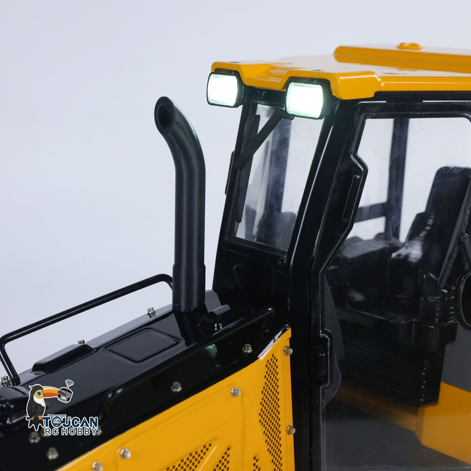 Remote control dozer with rear tow hook and 4 way hydraulic valve
