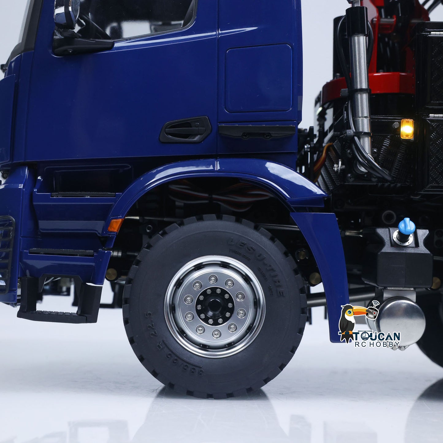 Remote control dump truck with sound module and built-in onboard crane
