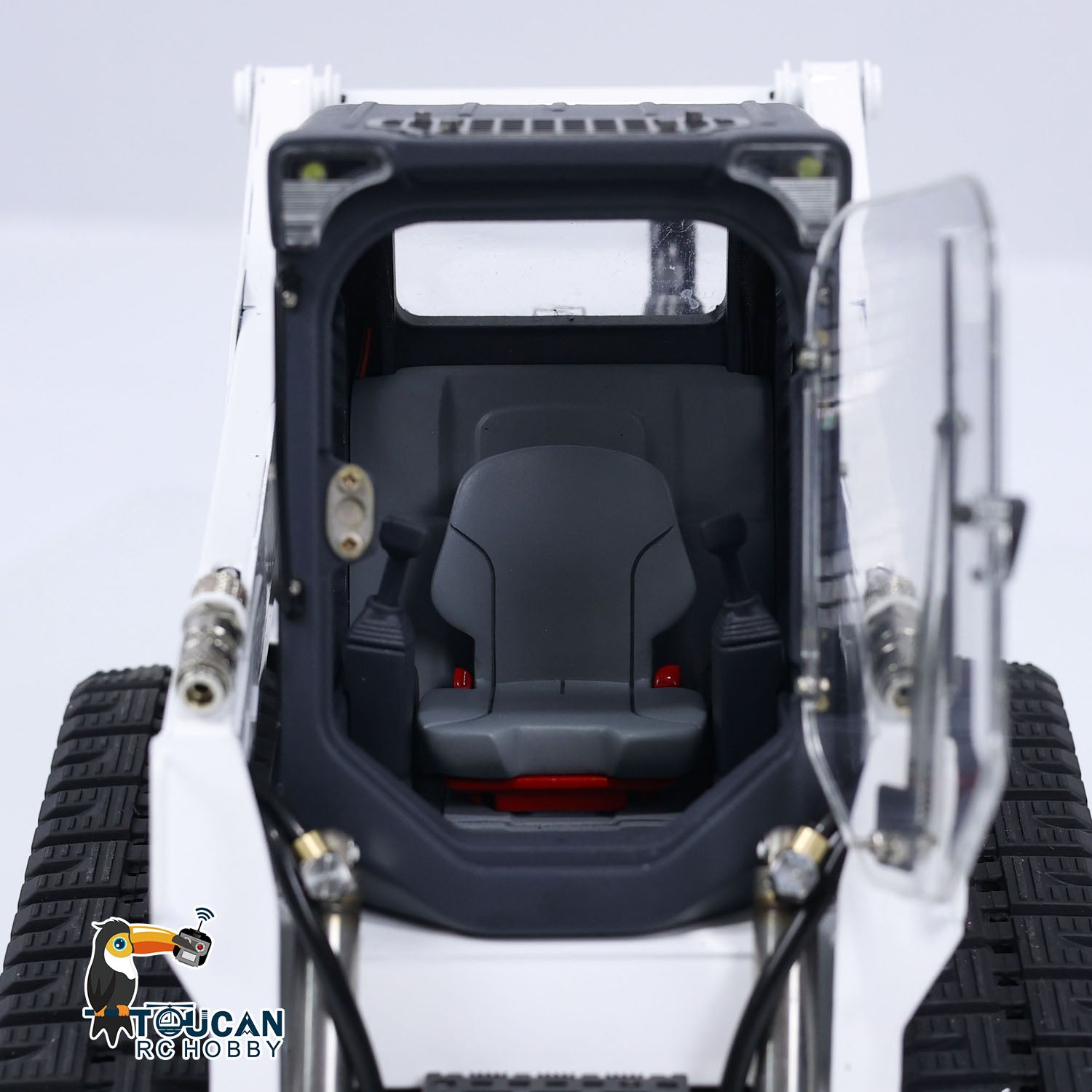 Red black RC construction skid loader SM770 TOUCAN fitted with I6S remote controller
