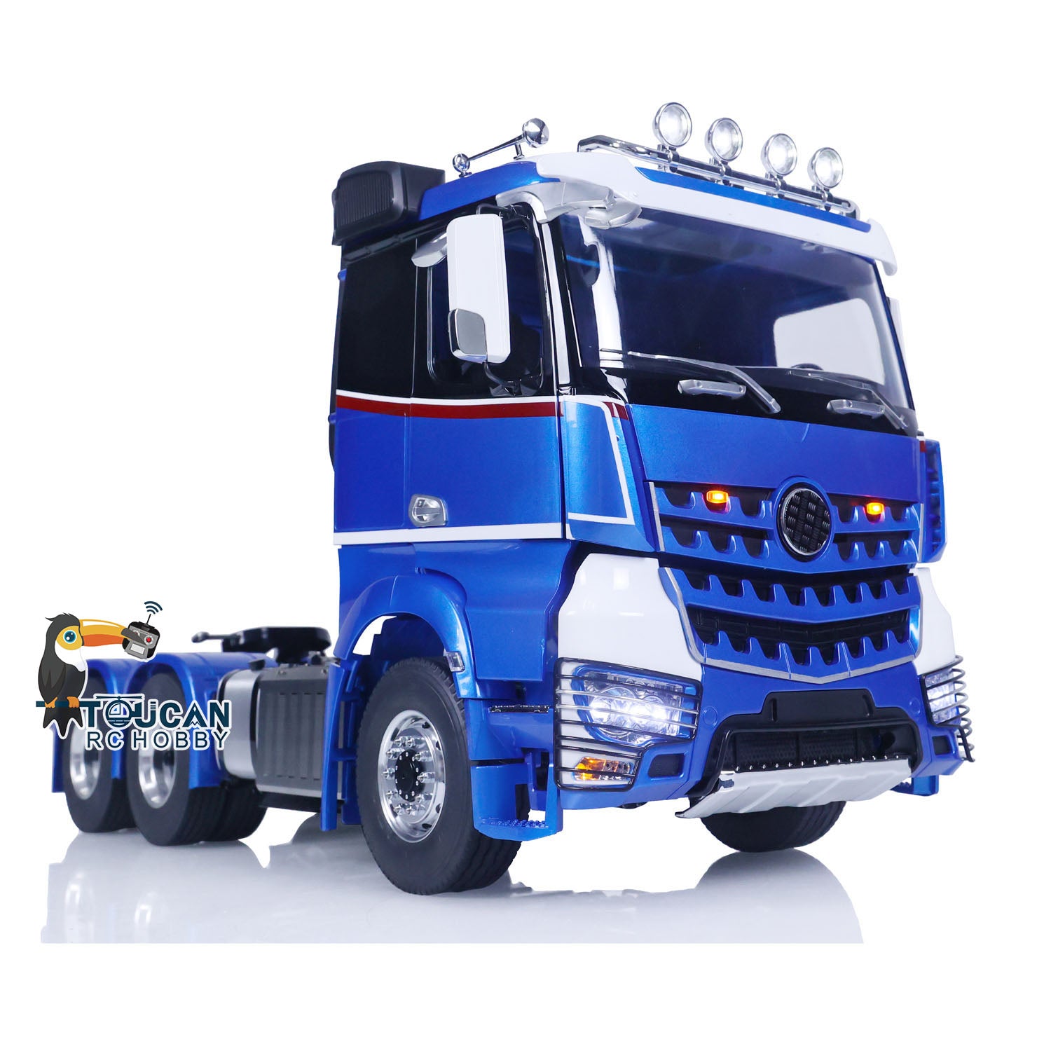 6x6 metal chassis RC tractor with front lights and blue top row lights
