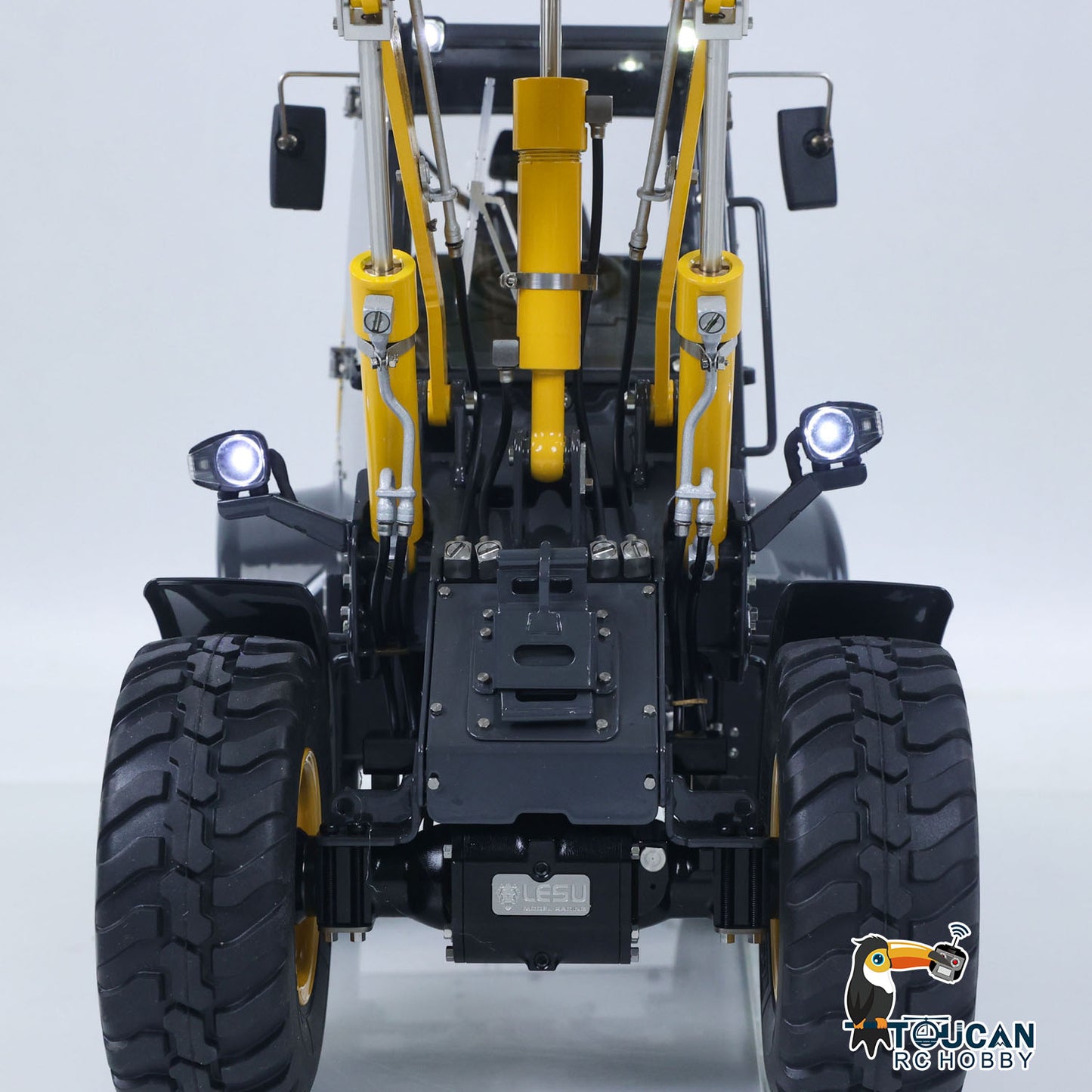 Remote metal hydraulic loader with integrated light and sound assembly
